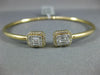 .79CT DIAMOND 18KT YELLOW GOLD ROUND & BAGUETTE CLUSTER FLEXIBLE BANGLE BRACELET