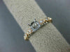 ESTATE .20CT DIAMOND 14KT WHITE & ROSE GOLD OPEN FILIGREE FLOWER ENGAGEMENT RING