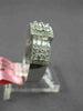 WIDE .76CT DIAMOND 18K WHITE GOLD ROUND & BAGUETTE CLUSTER HALO ANNIVERSARY RING