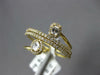 .50CT DIAMOND 18KT YELLOW GOLD ROUND BAGUETTE & OVAL MULTI ROW CRISS CROSS RING