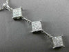 LARGE .68CT DIAMOND 18KT WHITE GOLD GRADUATING JOURNEY FLOATING PENDANT