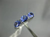 1.05CT DIAMOND & AAA TANZANITE 14KT WHITE GOLD 3D OVAL & ROUND ANNIVERSARY RING