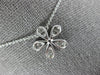 ESTATE .54CT DIAMOND 18KT WHITE GOLD 3D FLOWER SOLITAIRE FLOATING PENDANT