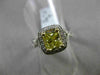 ESTATE 1.82CTW GIA FANCY YELLOW DIAMOND 18KT WHITE GOLD HALO ENGAGEMENT RING