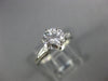 ESTATE 1.17CT DIAMOND PLATINUM 3D ROUND AND BAGUETTE 3 STONE ENGAGEMENT RING