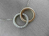 ESTATE .38CT DIAMOND 14KT WHITE & ROSE GOLD 3D CLASSIC CIRCLE LOVE KNOT NECKLACE