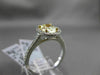 ESTATE 1.32CT GIA FANCY YELLOW DIAMOND 18KT WHITE GOLD OVAL HALO ENGAGEMENT RING