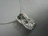 ESTATE 14KT WHITE 1.5CT X SHAPE BLACK & WHITE DIAMOND PENDANT