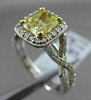 ESTATE 1.82CTW GIA FANCY YELLOW DIAMOND 18KT WHITE GOLD HALO ENGAGEMENT RING