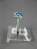ESTATE .65CT DIAMOND & AAA TRILLION CUT BLUE TOPAZ 14K WHITE GOLD BEZEL FUN RING