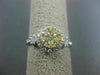 ESTATE WIDE .85CT WHITE & FANCY YELLOW DIAMOND 14K YELLOW GOLD HALO CLUSTER RING