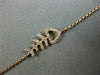 ESTATE .10CT PINK DIAMOND 18KT ROSE GOLD HAPPY SKELETON LUCKY FISH FUN BRACELET