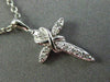 ESTATE SMALL .12CT DIAMOND 14KT WHITE GOLD 3D CROSS INFINITY FLOATING PENDANT