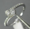ESTATE .50CT DIAMOND 14KT WHITE GOLD ROUND 3D TWO STONE CRISS CROSS LOVE RING