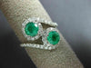 ESTATE 1.55CT DIAMOND & AAA EMERALD 18KT WHITE GOLD LOVE KNOT INFINITY FUN RING