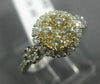ESTATE WIDE .85CT WHITE & FANCY YELLOW DIAMOND 14K YELLOW GOLD HALO CLUSTER RING