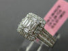 ESTATE LARGE .66CT ROUND & BAGUETTE DIAMOND 18KT WHITE GOLD HALO ENGAGEMENT RING