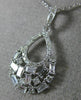 ESTATE .52CT ROUND & BAGUETTE DIAMOND 14KT WHITE GOLD TEAR DROP FLOATING PENDANT