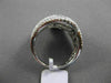 ESTATE 2.15CT BAGUETTE & ROUND DIAMOND 18KT WHITE GOLD INTERTWINNING FUN RING