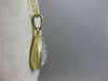 ESTATE DIAMOND 14K WHITE & YELLOW GOLD INVISIBLE MODERN PENDANT  #3666