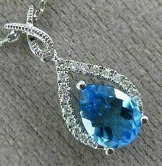 1.48CT DIAMOND & AAA PEAR SHAPE BLUE TOPAZ 14KT WHITE GOLD 3D TEAR DROP PENDANT