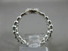 ESTATE .64CT DIAMOND 14KT WHITE GOLD CLUSTER OVAL CRISS CROSS X FRIENDSHIP RING