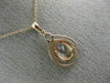 .77CT DIAMOND & AAA OVAL MORGANITE 14KT ROSE GOLD 3D INFINITY TEAR DROP PENDANT