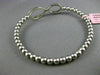ESTATE .70CT DIAMOND 14KT WHITE GOLD 3D INFINITY FLEXIBLE LOVE BANGLE BRACELET