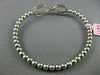 ESTATE .70CT DIAMOND 14KT WHITE GOLD 3D INFINITY FLEXIBLE LOVE BANGLE BRACELET
