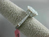 ESTATE LARGE .69CT ROUND & BAGUETTE DIAMOND 18KT WHITE GOLD OVAL ENGAGMENT RING