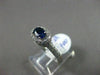 ESTATE 1.03CT DIAMOND & AAA SAPPHIRE 18KT WHITE GOLD HALO DESIGN ENGAGEMENT RING
