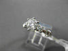 ESTATE 1.12CT ROUND & BAGUETTE DIAMOND 14KT WHITE GOLD SOLITAIRE ENGAGEMENT RING