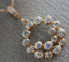 ESTATE .47CT DIAMOND 14KT ROSE GOLD 3D BEZEL HAPPY FACE BEZEL CIRCULAR PENDANT