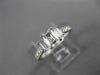 ESTATE .82CT DIAMOND PLATINUM THREE STONE EMERALD CUT FILIGREE ENGAGEMENT RING