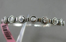 ESTATE .60CT DIAMOND 14KT WHITE GOLD 3D 9 STONE ETOILE FLEXIBLE BANGLE BRACELET