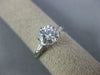ESTATE 1.17CT DIAMOND PLATINUM 3D ROUND AND BAGUETTE 3 STONE ENGAGEMENT RING