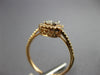 ESTATE .50CT DIAMOND 18KT ROSE GOLD ROUND & BAGUETTE CLUSTER HALO PROMISE RING