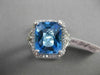 ESTATE 6.43CTW DIAMOND & AAA EXTRA FACET BLUE TOPAZ 14KT WHITE GOLD HALO RING