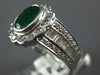 WIDE 2.19CT DIAMOND & EMERALD 18KT WHITE GOLD OVAL ROUND & BAGUETTE FLOWER RING