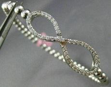 ESTATE .70CT DIAMOND 14KT WHITE GOLD 3D INFINITY FLEXIBLE LOVE BANGLE BRACELET