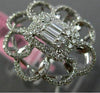 ESTATE LARGE .78CT ROUND & BAGUETTE DIAMOND 18KT WHITE GOLD FLOWER COCKTAIL RING