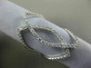 ESTATE LARGE .85CT DIAMOND 18KT WHITE GOLD 3D OPEN DOUBLE INFINITY LOVE RING