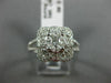 ESTATE LARGE .80CT DIAMOND 18KT WHITE GOLD INVISIBLE SQUARE FLOWER LOVE FUN RING