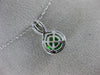 ESTATE 1.20CT DIAMOND & AAA GREEN GARNET 14KT WHITE GOLD ROUND INFINITY PENDANT