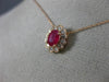 ESTATE .71CT DIAMOND & AAA OVAL CUT RUBY 14KT ROSE GOLD FLOWER FLOATING PENDANT