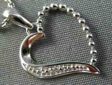 ESTATE SMALL .03CT DIAMOND 14KT WHITE GOLD OPEN HEART FILIGREE FLOATING PENDANT