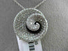 ESTATE LARGE 1.34CT DIAMOND & ONYX 18KT WHITE GOLD SWIRL SHELL FLOATING PENDANT