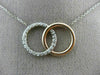 ESTATE .38CT DIAMOND 14KT WHITE & ROSE GOLD 3D CLASSIC CIRCLE LOVE KNOT NECKLACE