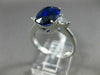 3.07CT TRILLION DIAMOND & OVAL SAPPHIRE 18KT WHITE GOLD 3 STONE ENGAGEMENT RING