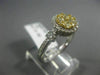 ESTATE WIDE .85CT WHITE & FANCY YELLOW DIAMOND 14K YELLOW GOLD HALO CLUSTER RING